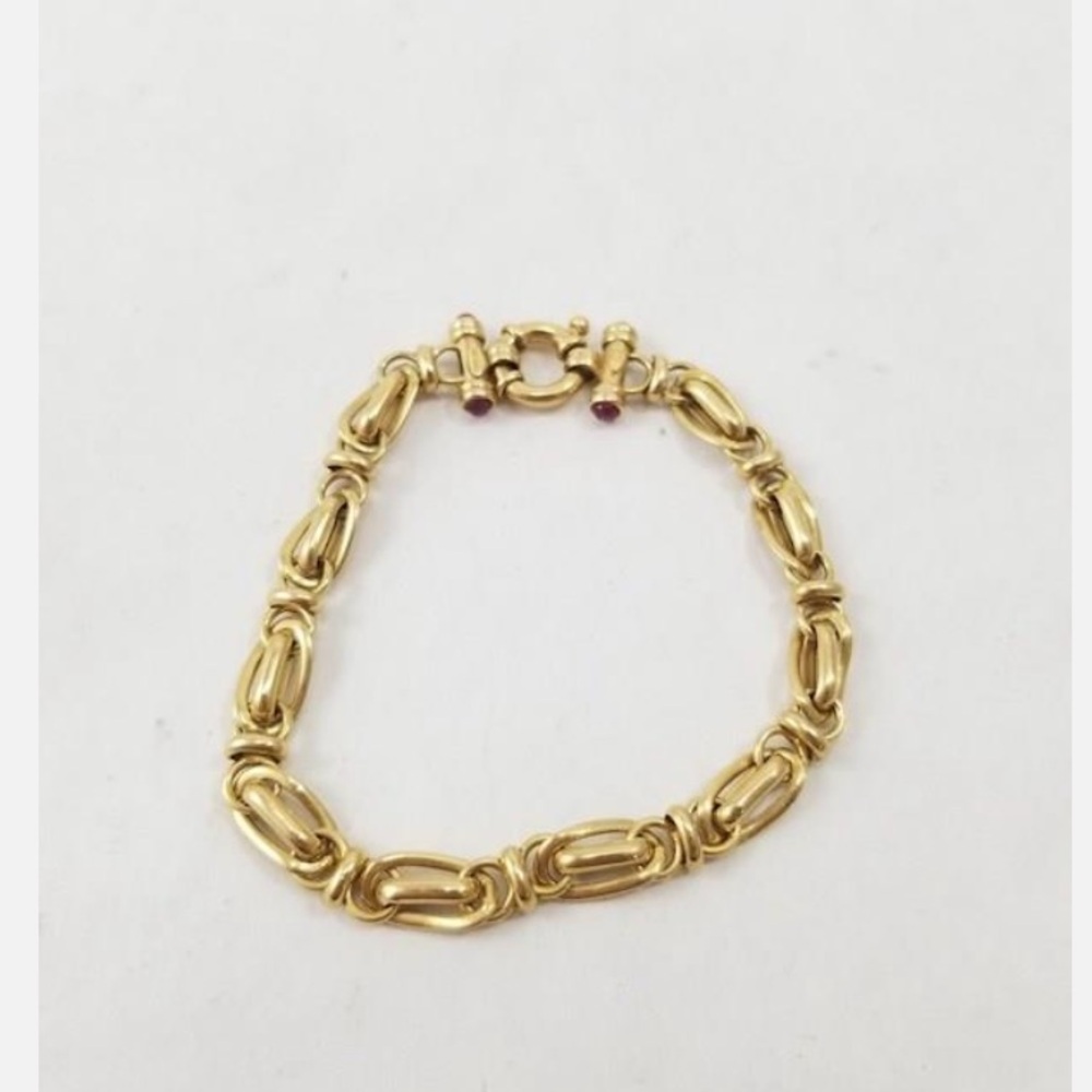 Beautiful vintage 7inch 14k gold bracelet with ruby cabochons adorned on clasp